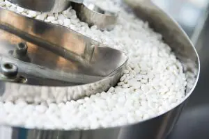 Tablets - solid dosage form obtained by compression of powders and granules containing one or more drug substances with or without the addition of auxiliary substances.